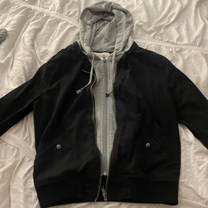 black bomber jacket with grey hoodie